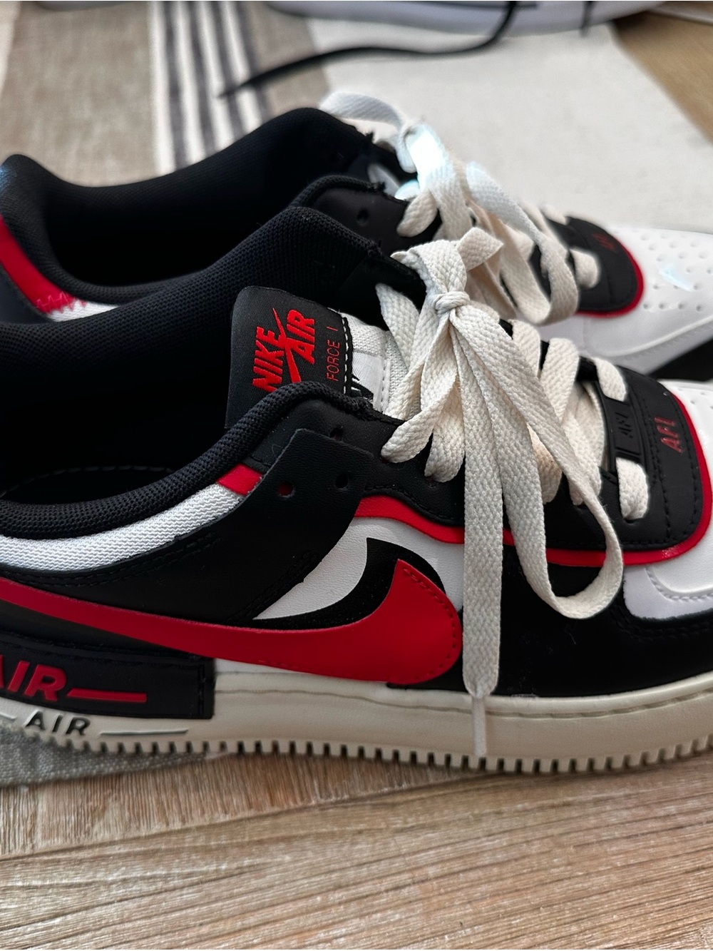 Nike Air Women's Low-Top Sneakers in Black/White/Red